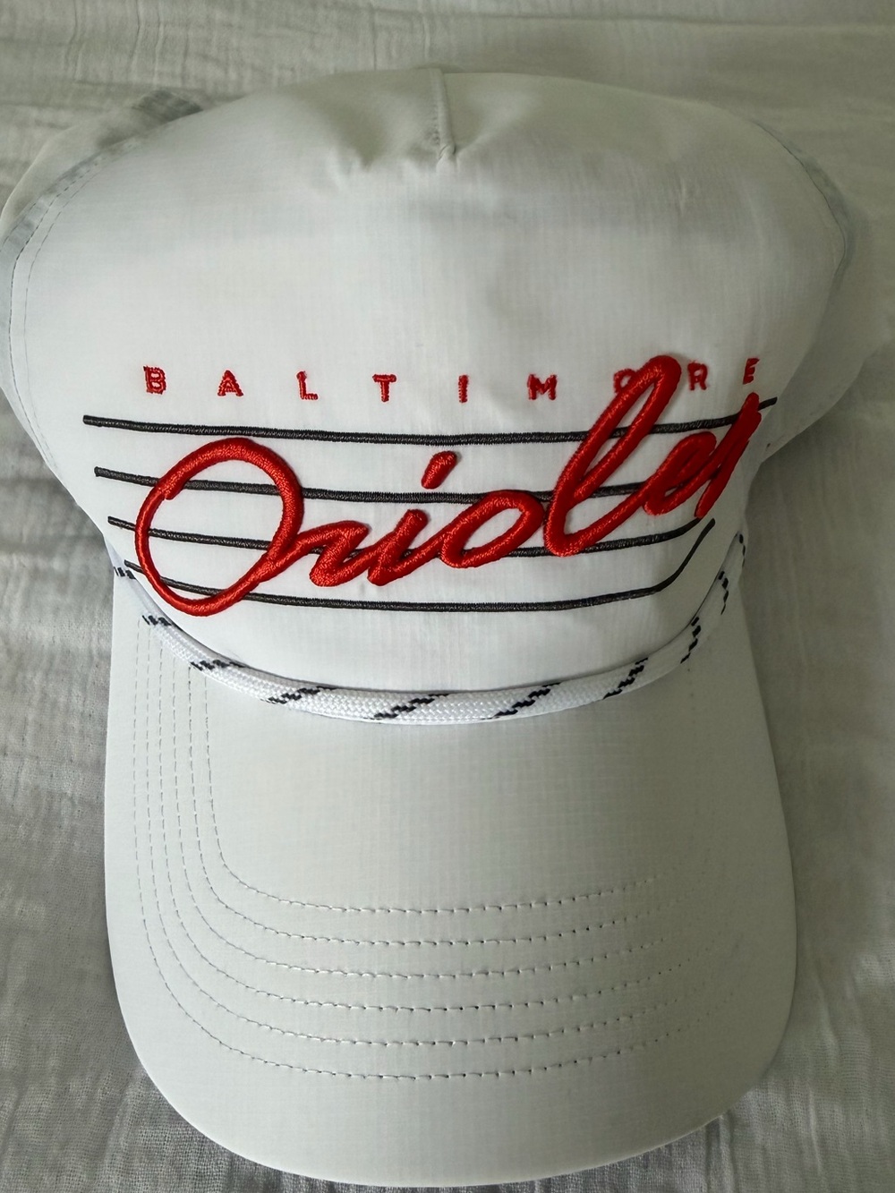 Baltimore Orioles White Baseball Cap with Orange Script Logo
